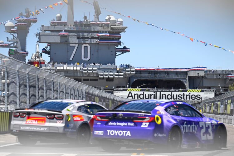 Heim triumphs in naval base race